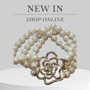 Elegant Pearl Bracelet with Silver Rose Accent